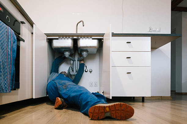 Professional Emergency Plumber technician working in Hutchinson, KS